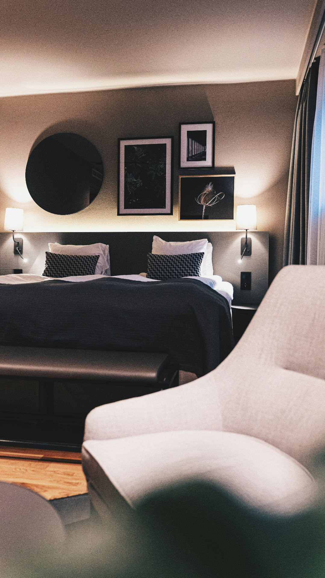 Professional hotel asset management consultation - expert advisors reviewing hotel investment strategies and owner representative services in modern hotel setting